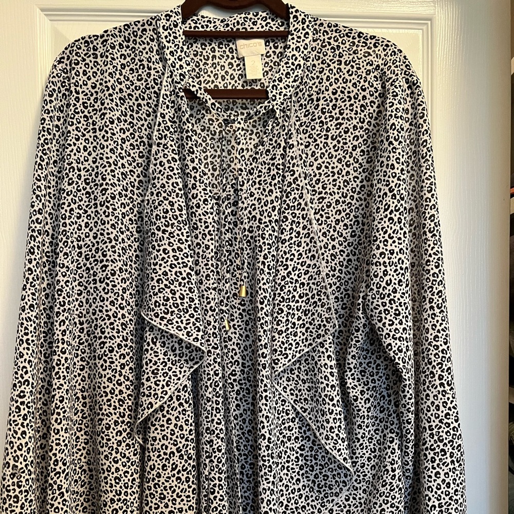 Chico’s size 2.   L.  Ruffle front. Tie blouse. Black and white.
